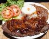 Bife acebolado com molho de cereja