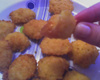 Bolinho de arroz com queijo ralado