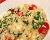Risoto musarela de bufala, rúcula e tomate cereja