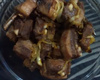 Costelinha de javali acebolada