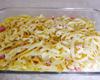 Macarrão ao molho branco com presunto e queijo