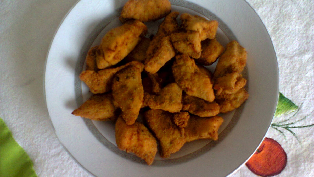 Frango à milanesa tipo nuggets