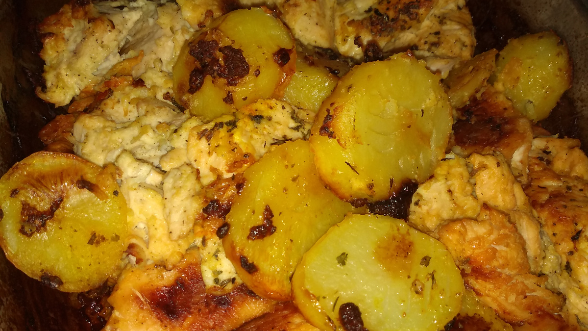 Peito de frango com creme de cebola