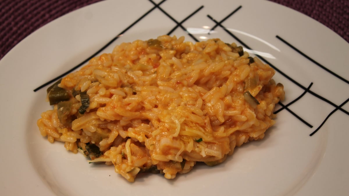 Risoto com tomate seco, mussarela e rúcula da Tam