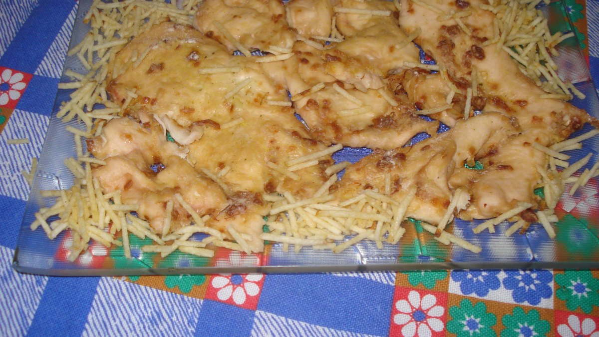 Peito de frango com creme de cebola