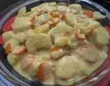 Filé de merluza com molho de laranja e legumes