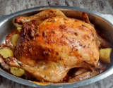 Frango assado recheado com farofa de miúdo