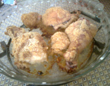 Coxas de frango empanadas e assadas