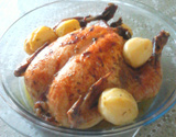 Frango assado com batatas