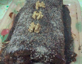 Rocambole de doce de leite com cobertura de chocolate