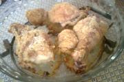 Coxas de frango empanadas e assadas