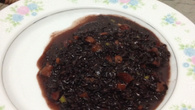 Arroz negro com amêndoas e damasco