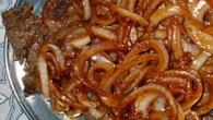 Bife acebolado delicioso