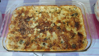 Concha de batata rostie com bacalhau gratinado