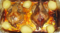 Galeto assado com batatas