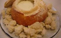 Fondue de gorgonzola do pão italiano