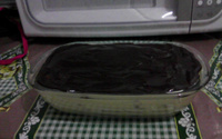 Torta de biscoito com maracujá e cobertura de chocolate