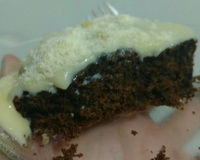 Bolo de Oreo com cobertura de leite em pó