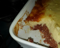 Escondidinho de carne de sol com batata e creme com requeijão.