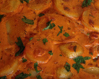 Filé de peixe ao molho de leite de coco e creme de leite