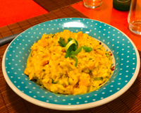 Risoto cremoso de salmão e alho poró