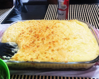 Escondidinho de carne seca com purê de batatas