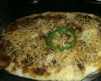 Macarrão gratinado com carne moída