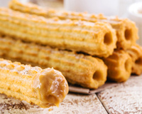 Nem pudim, nem pavê: a sobremesa que mais faz sucesso aqui em casa é o churros com doce de leite