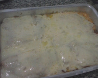 Filé de tilápia com batatas e requeijão ao forno