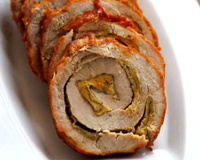 Lombo recheado com sálvia empanada em rodelas