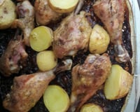 Coxa de frango assada com batatas