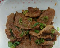 Carne na panela de pressão com cebola