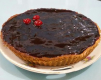Torta de cream cheese com geleia de jabuticaba