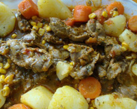 Moelas com batatas, cenouras e milho verde