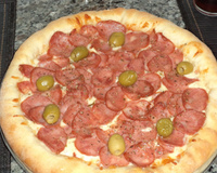 Pizza de forno ou churrasqueira