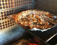 Peixe assado na grelha