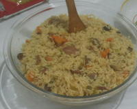 Arroz com calabresa, bacon e carne de sol