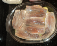 Sardinha ao forno com batata, cebola e tomate