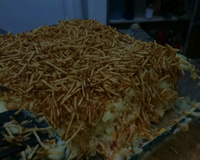 Batata recheada em travessa