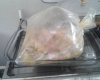 Coxa e sobre coxa assada no saco de polyéster