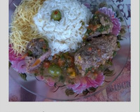 Bife a rolê com linguiça e cenoura