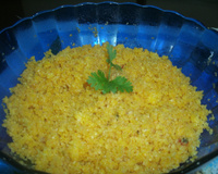 Macarrão com tomate seco e rúcula