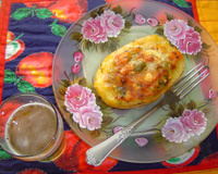 Batatas recheadas com moqueca de camarão