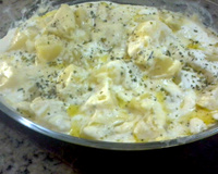 Batata gratinada cozida no leite
