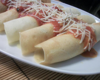 Panqueca com recheio de carne moída e mussarela