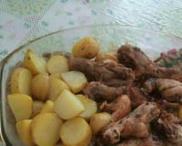 Coxa de frango assada com batatas