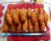 Bolinho de arroz com queijo ralado
