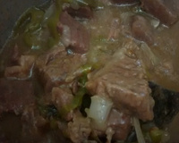 Carne cozida ao molho de cerveja