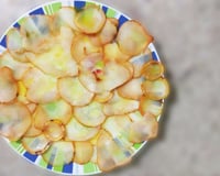 Carpaccio de pera com mostarda, vinho e nozes