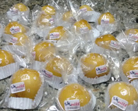 Bala de coco caramelizada (bala baiana ou bala de ovo)